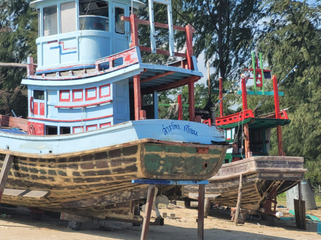 Boat on the beach in Sam Roi Yot close up