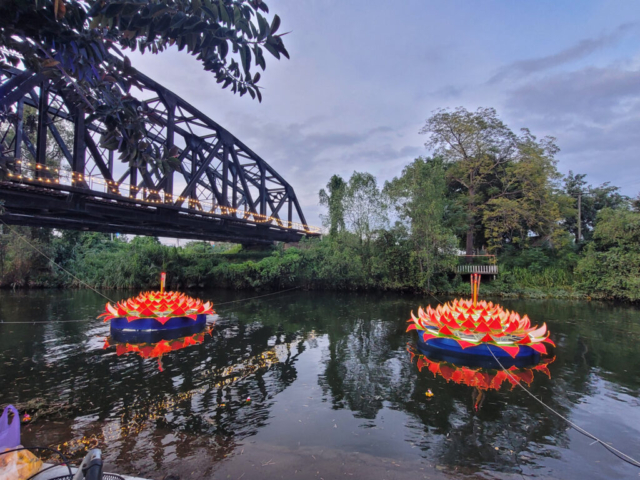 Loy Krathong floats under the bridge in Pranburi