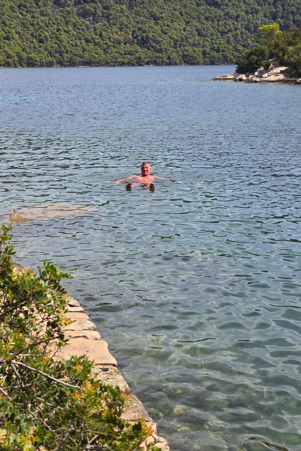 Ben swimming in the pristine waters of the 'lakes'