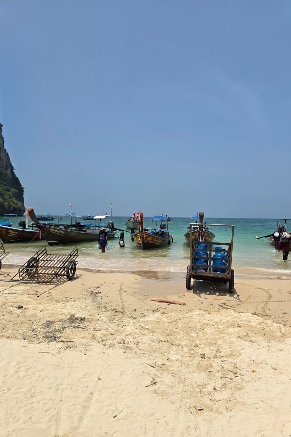 Deliveries arriving on the west beach of Railay