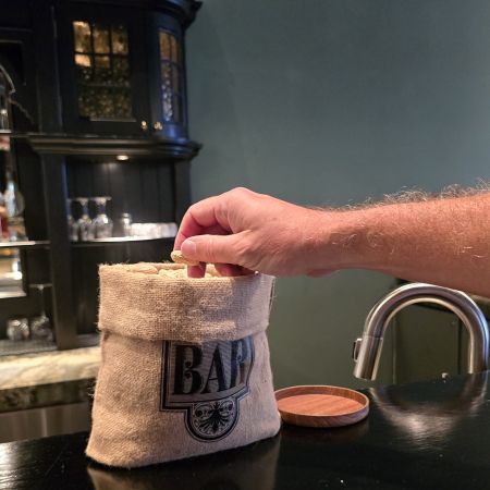 Monkey nuts, the tradition is to throw the shells on the floor.